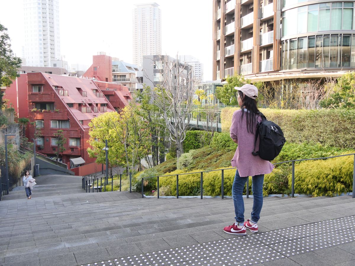 Terrace overlooking red-brick apartment blocks and towers in Tokyo